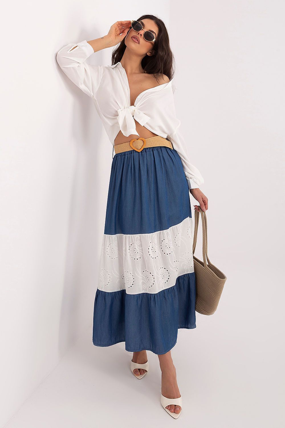 Blue tiered midi skirt with white lace hem panels and textured eyelet trim
