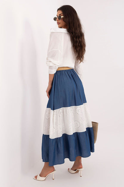Blue tiered midi skirt with white lace band and eyelet trim near hem