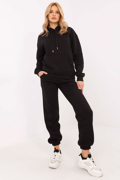 Black two-piece hoodie and jogger set with drawstring hood and ankle cuffs