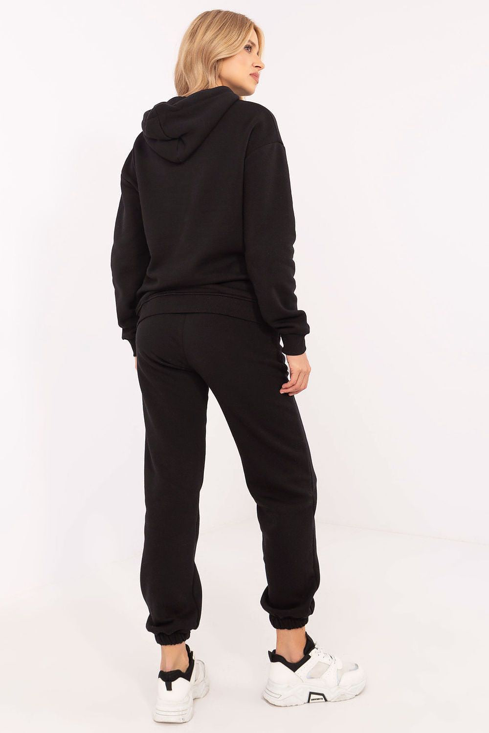 Black hoodie and jogger set viewed from back with drawstring hood and cuffed ankles