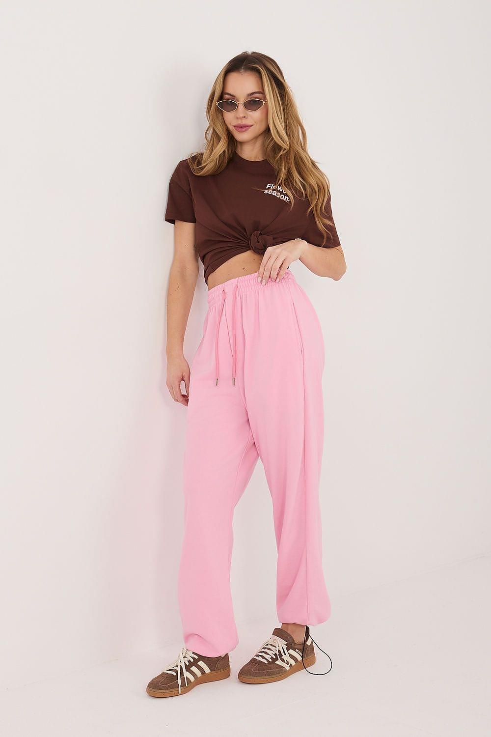 Pink track trousers with drawstring waist and relaxed straight legs