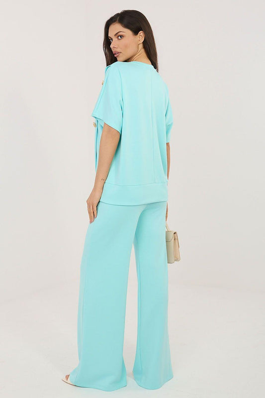 Women's turquoise top and wide-leg pants set, back view, with side draw ties