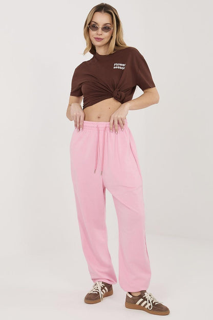 Pink track trousers with gathered drawstring waist and side pockets
