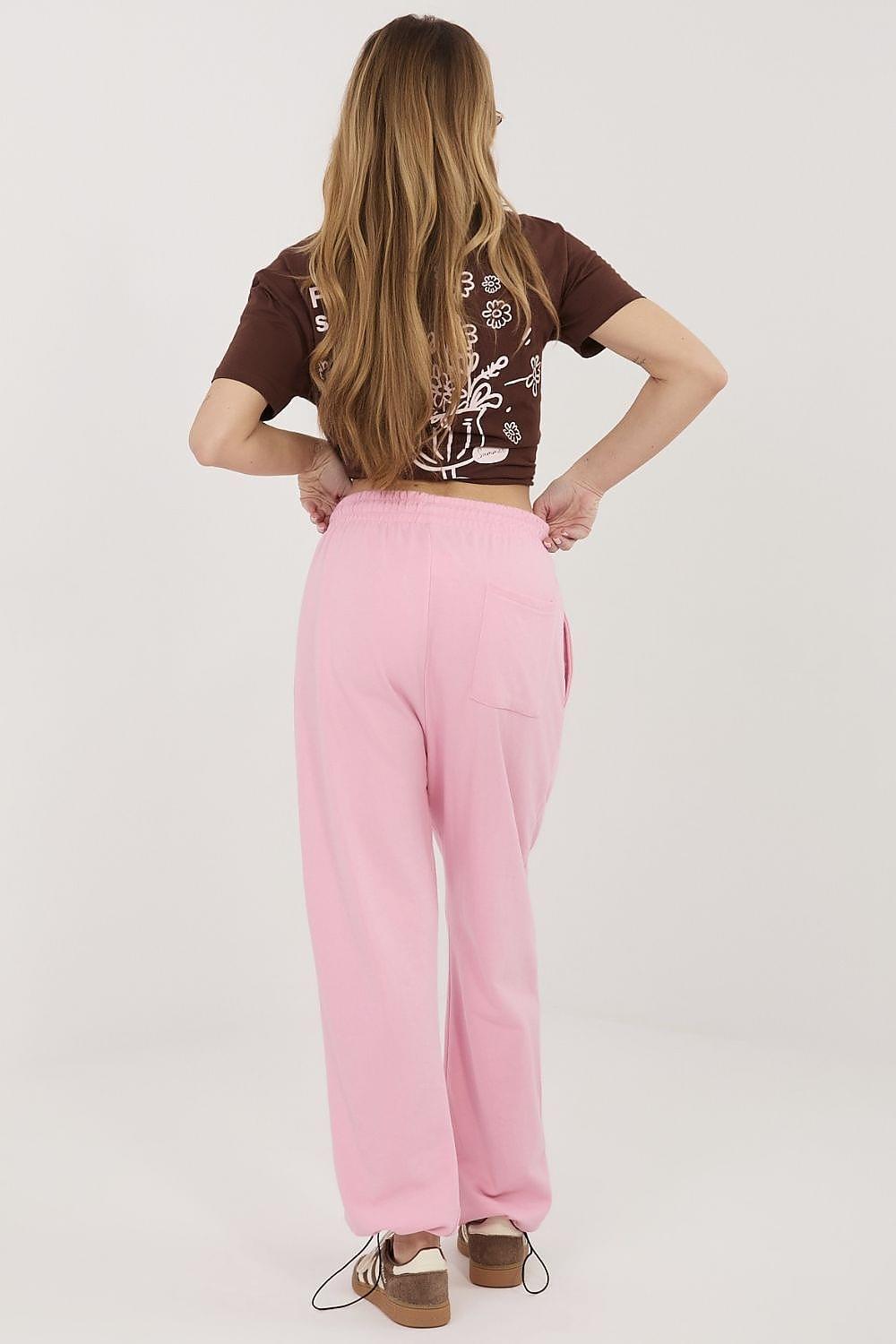 Pink track trousers, back view, drawstring waist with relaxed full-length legs