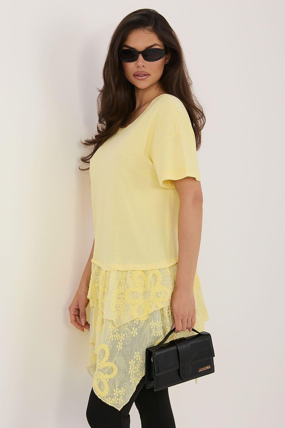 Yellow blouse with short sleeves and layered lace peplum hem