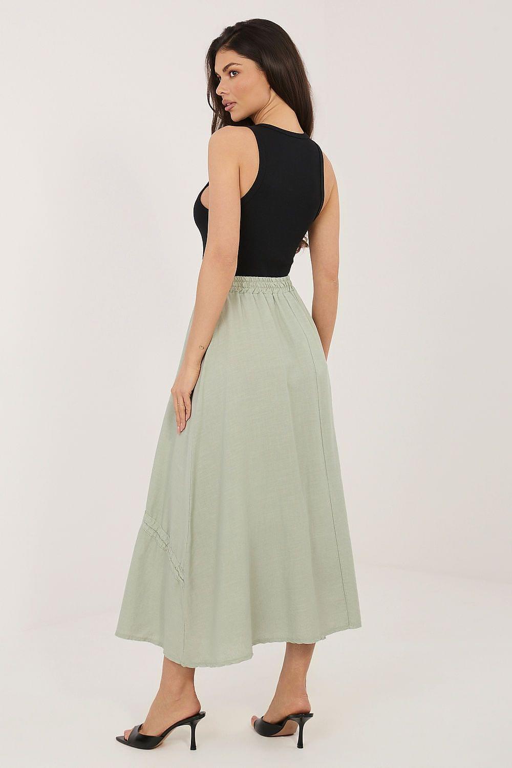 Light green long skirt with gathered waist and tassel drawstring side ties, back view