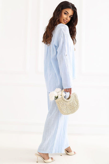 Women’s light blue wide-leg trousers with high waist and side-stitched seams