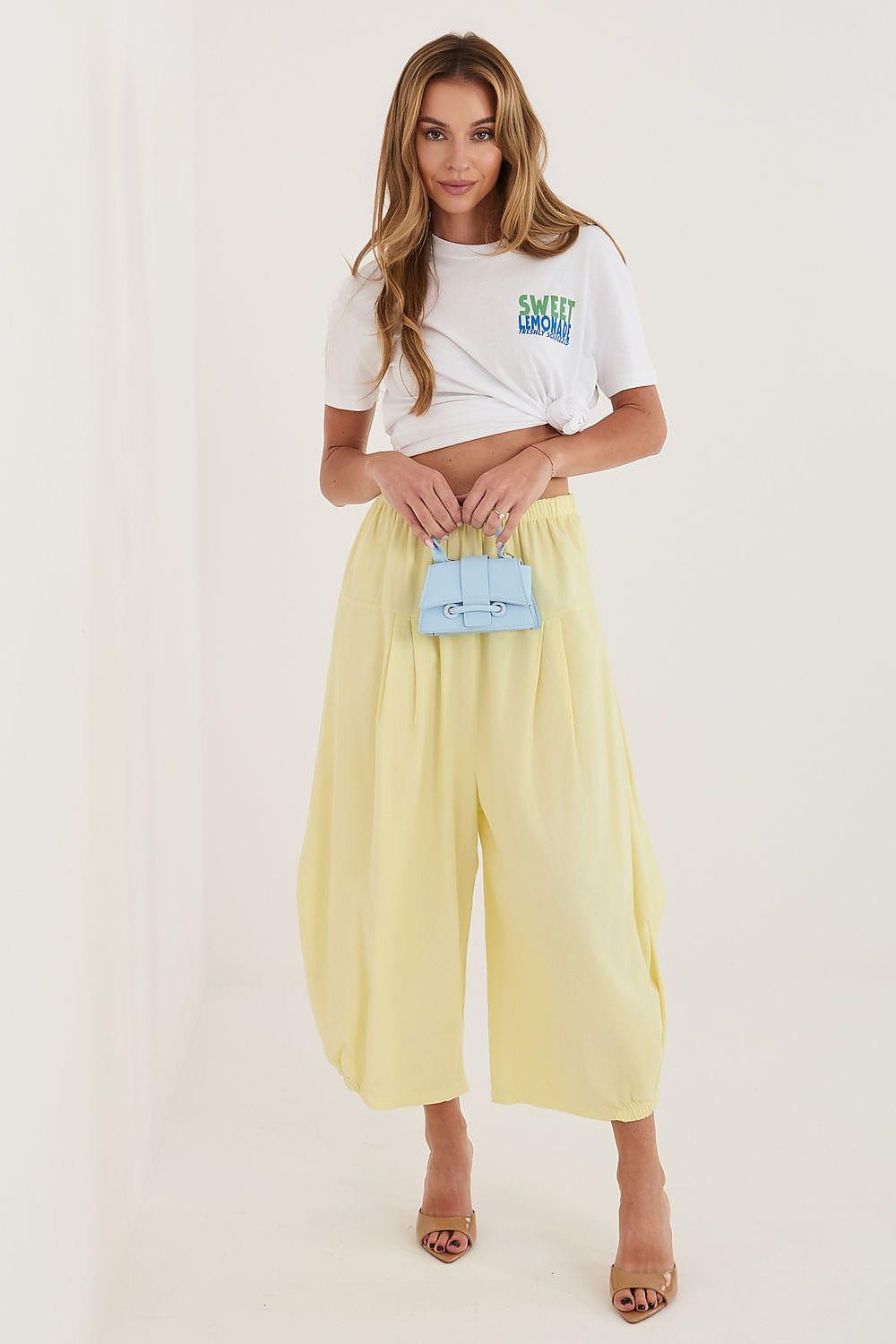 Yellow wide-leg trousers with elastic waist and gathered ankle hem