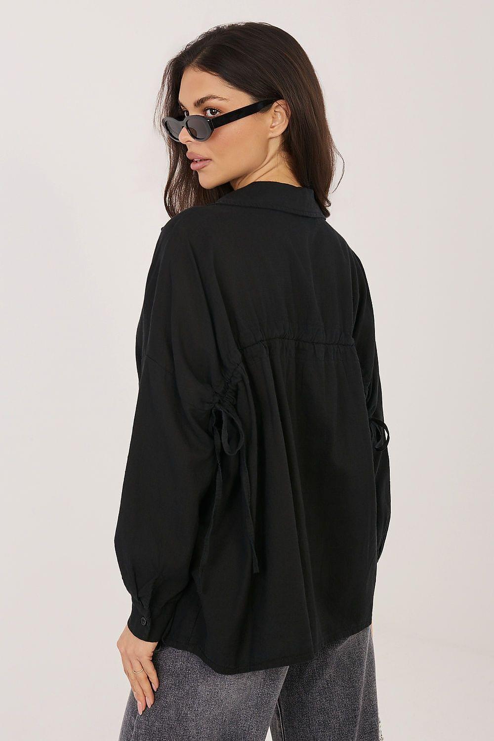 Black long sleeve shirt, back view with gathered yoke and tied drawstring detail