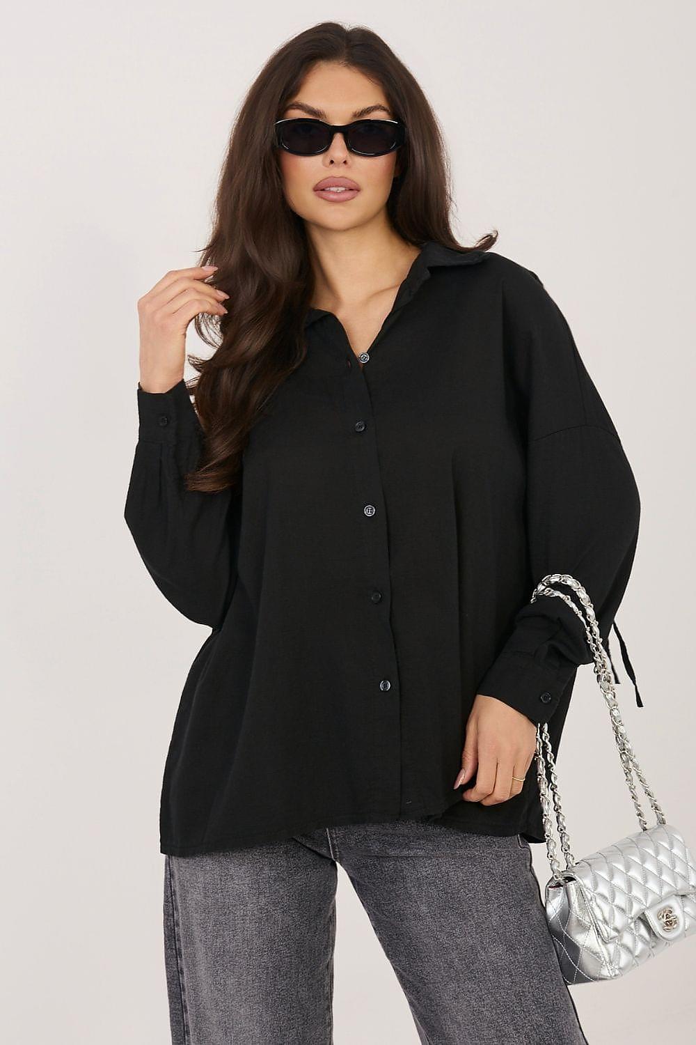 Black long sleeve button-up shirt with collar and rounded front, worn with sunglasses