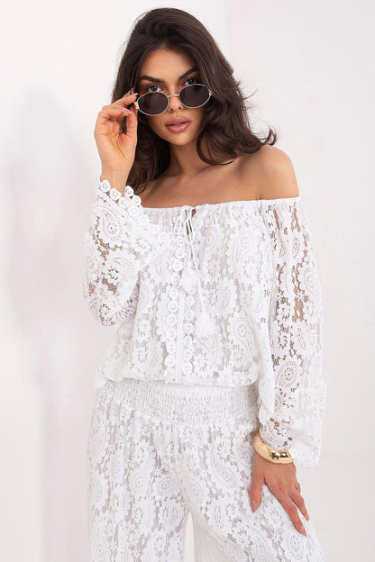 White off-shoulder lace blouse with long sleeves and textured floral pattern