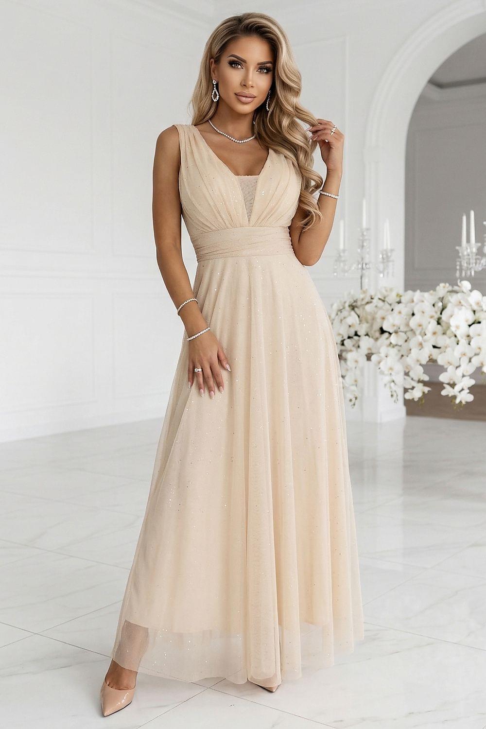 Long V-neck evening dress by Numoco, beige with ruched bodice and flowing chiffon skirt