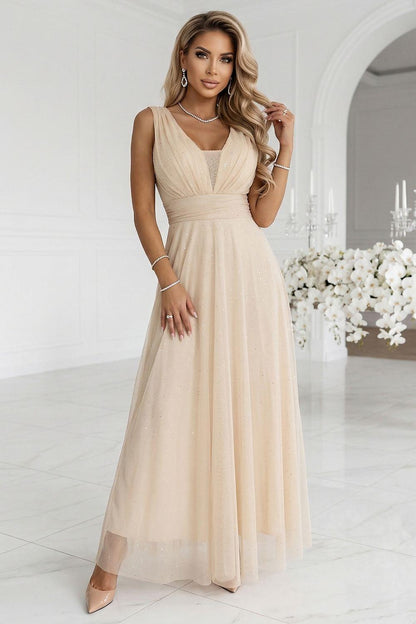 Long V-neck evening dress by Numoco, beige with ruched bodice and flowing chiffon skirt