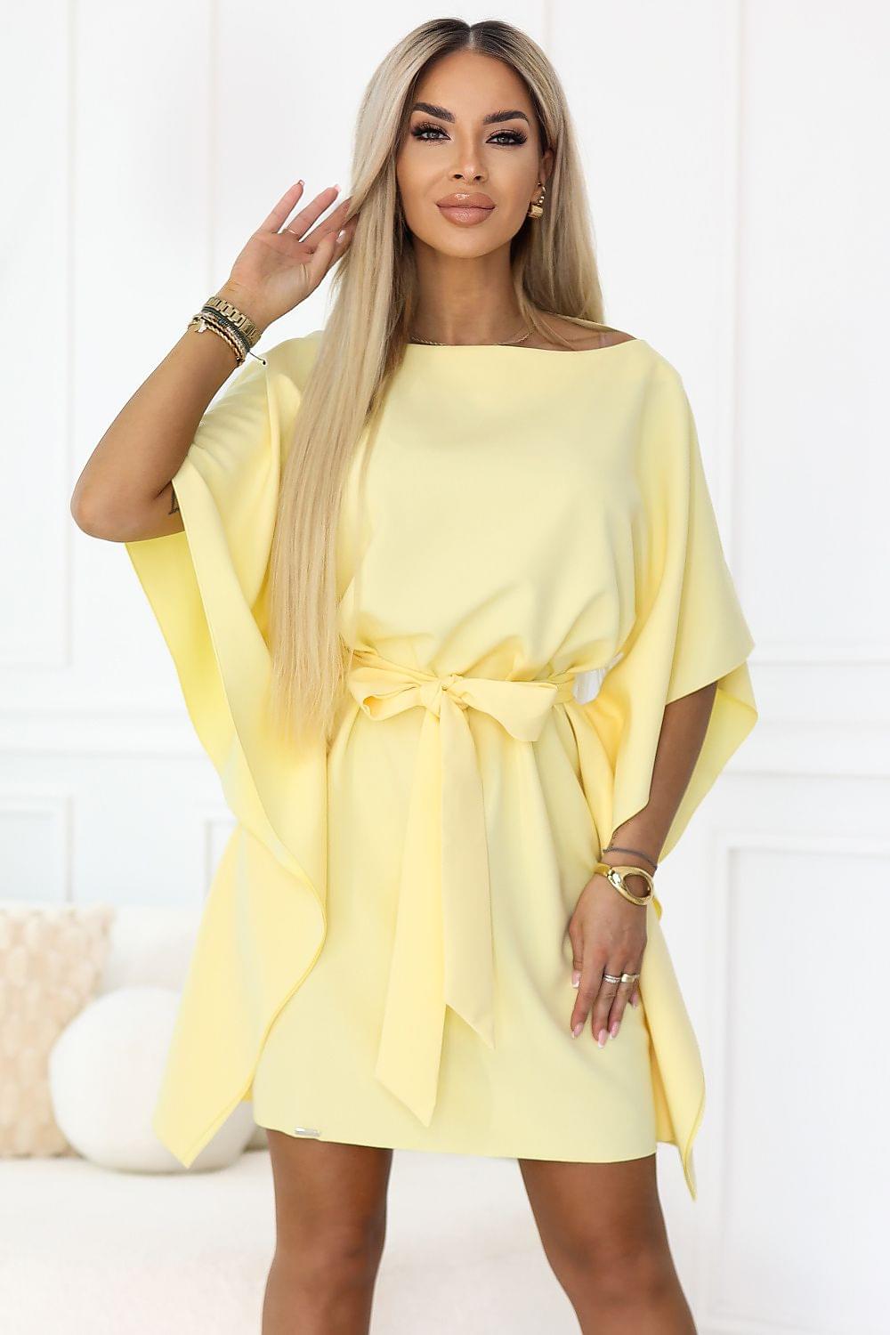 Numoco daydress in pale yellow with wide sleeves and tied waist