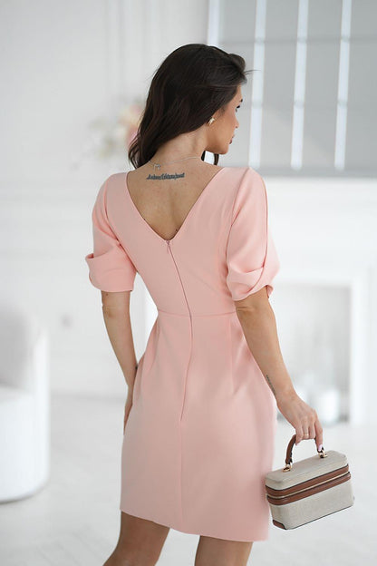 Light pink cocktail dress back view with V-back neckline and short puff sleeves