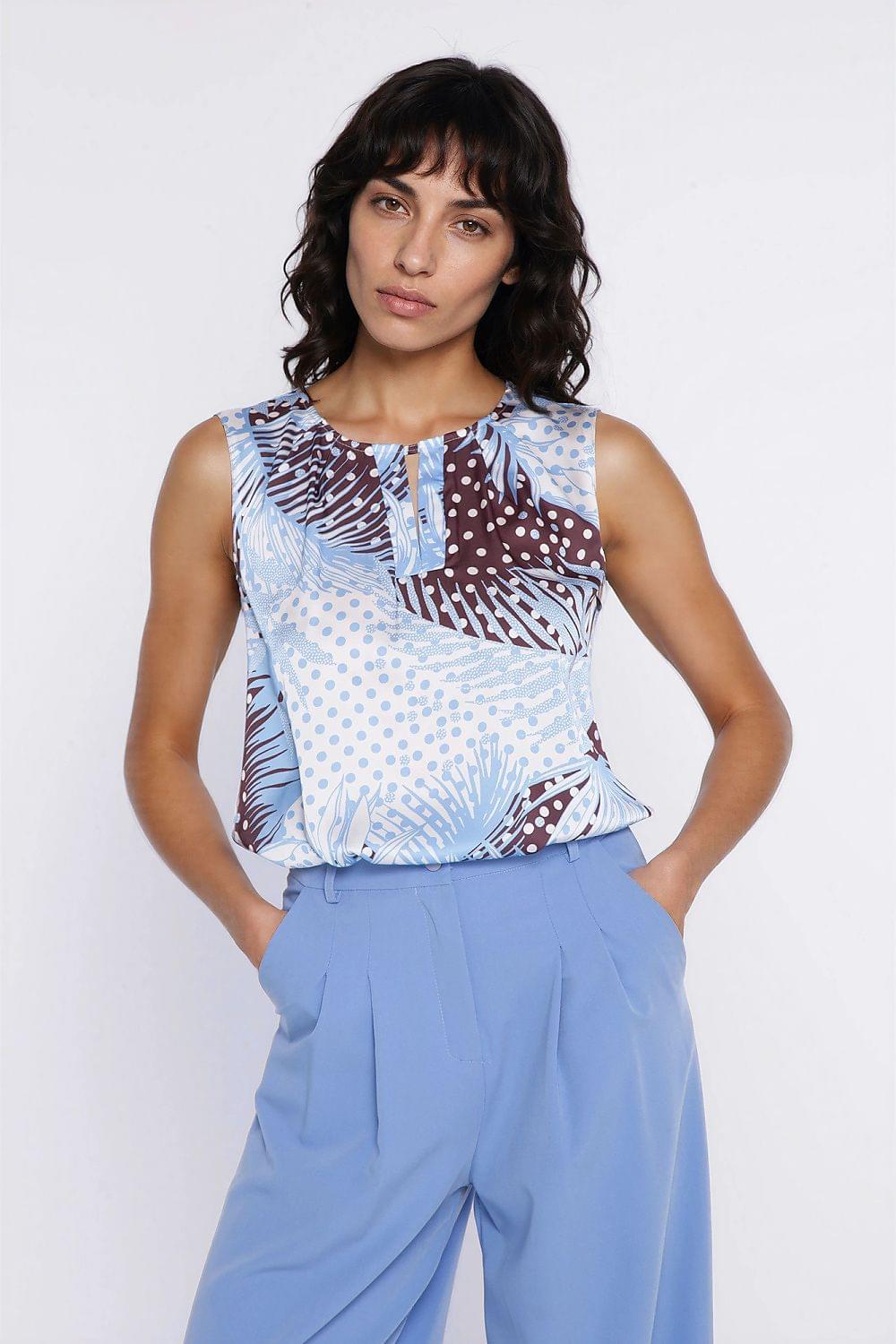 Sleeveless patterned blouse in blue/white/burgundy with split neckline and front ties