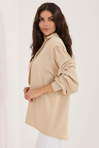 Beige blouse side view with neck tie and loose long sleeves