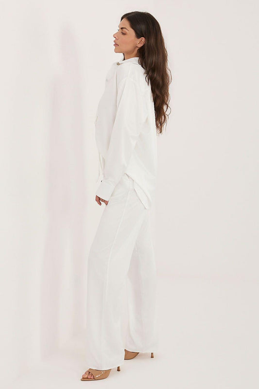 White long-sleeve blouse and matching pants set, side view, V-neck button front