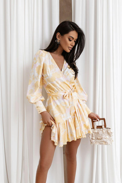 Cream floral daydress with V-neck, long puff sleeves, tie-belt waist and tiered mini skirt