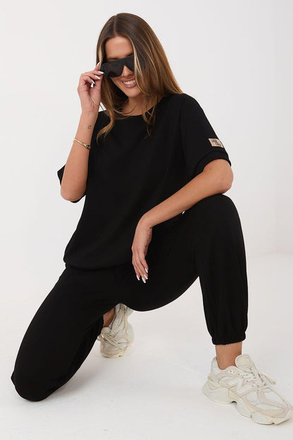 Rue Paris model 226987 matching set in black: short-sleeve top and jogger pants
