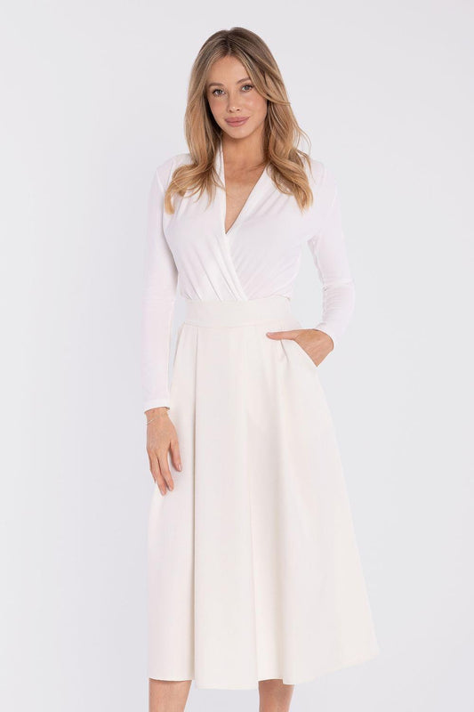 Off-white A-line midi skirt with elastic waistband and relaxed drape