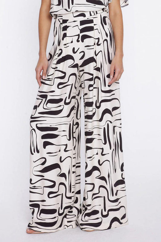 Women’s trousers model 228007 Nife: high-waist wide-leg with abstract black-and-white print