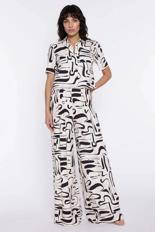 Women’s wide-leg trousers with abstract black-and-white print, high waist