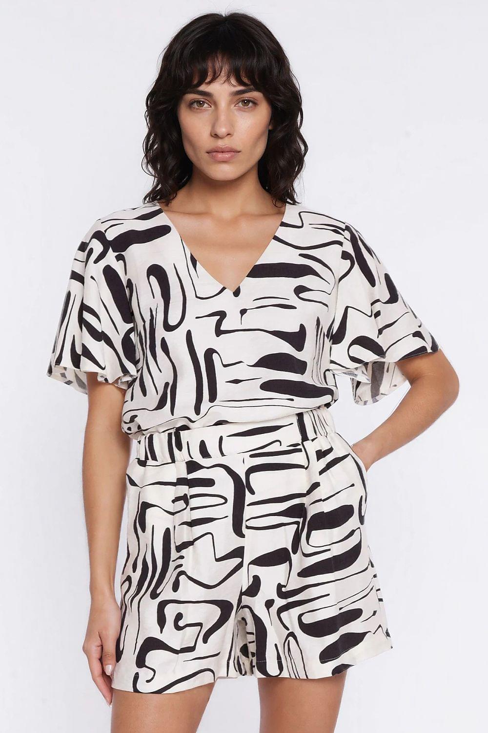 Black-and-white abstract print shorts with tie waist and relaxed fit