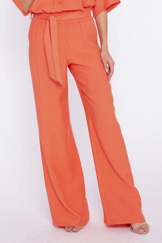 Orange wide-leg pants with tie waist and buttoned front, loose fit