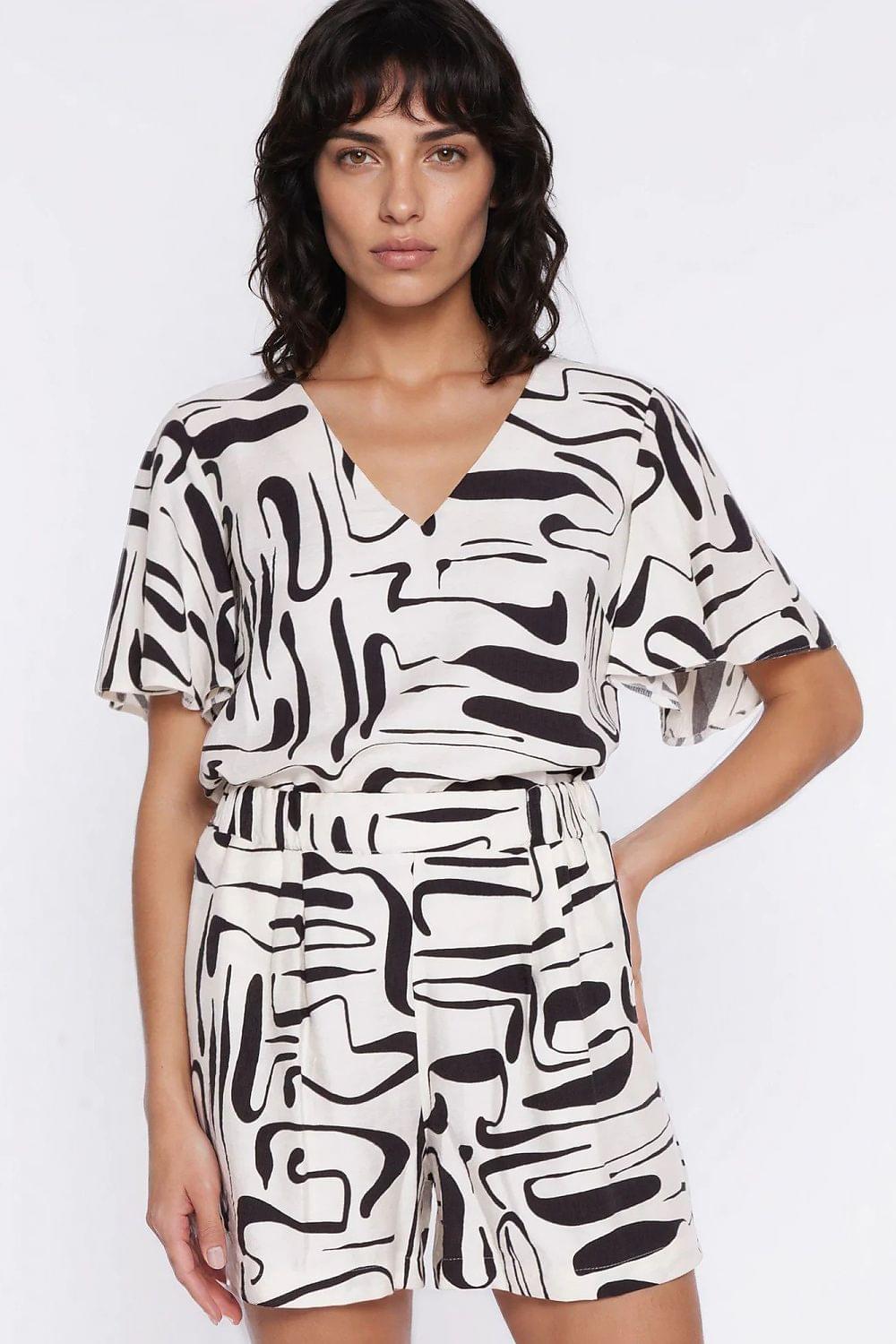 Nife blouse with V-neck and short sleeves, black-and-white abstract print, belted waist