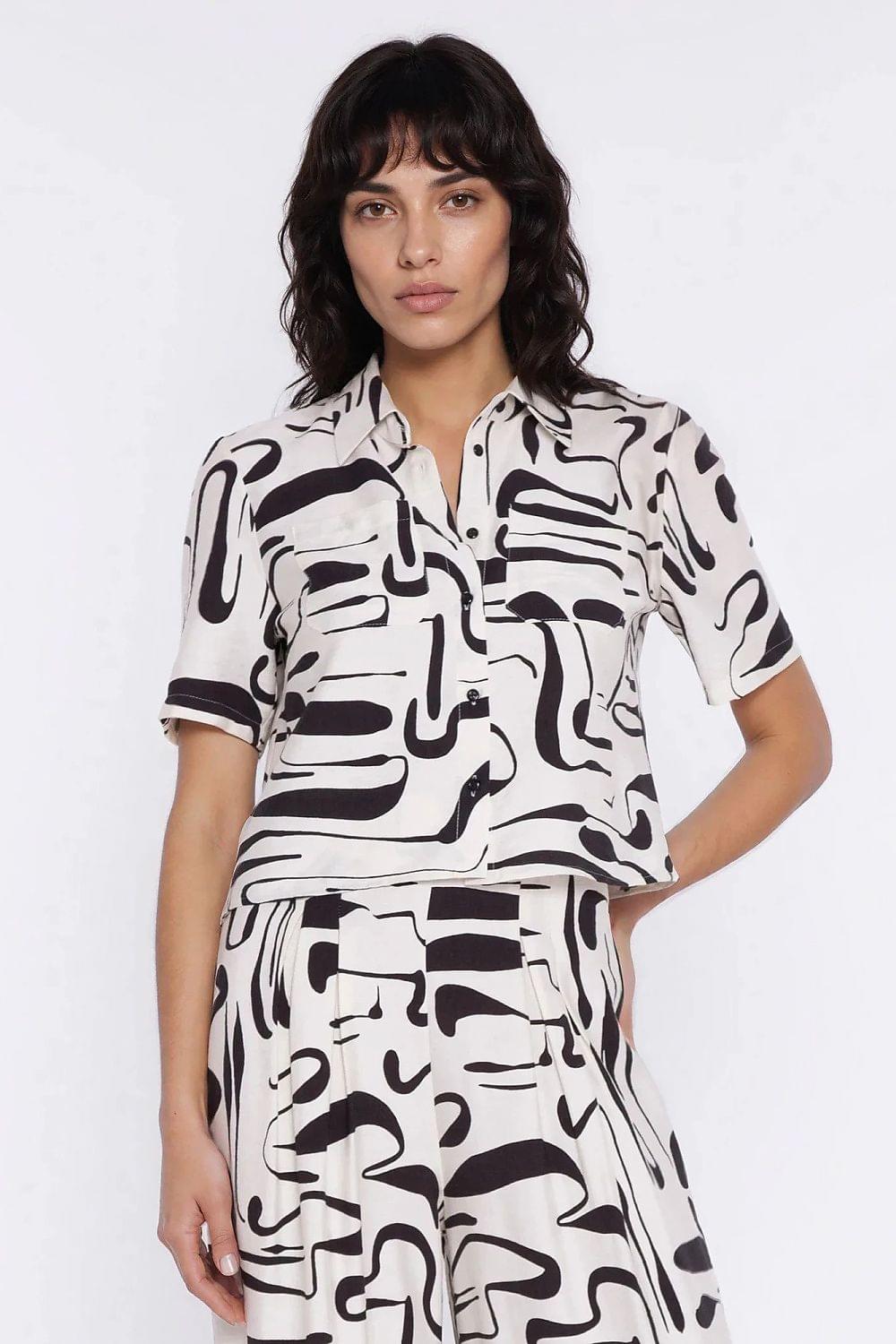 Collared short-sleeve button-front shirt, off-white with black abstract pattern