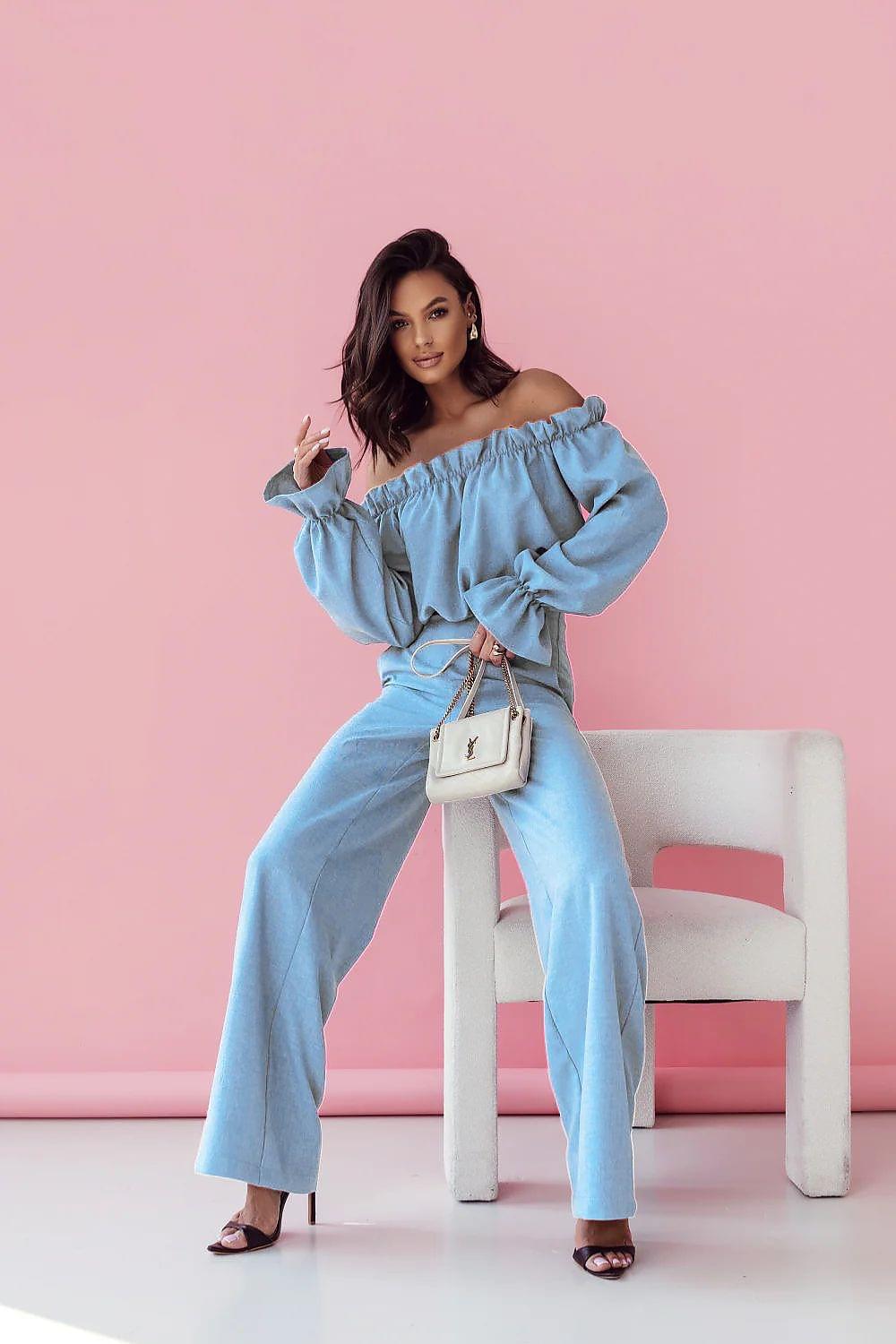 Light blue off-shoulder top with matching wide-leg pants and tied belt