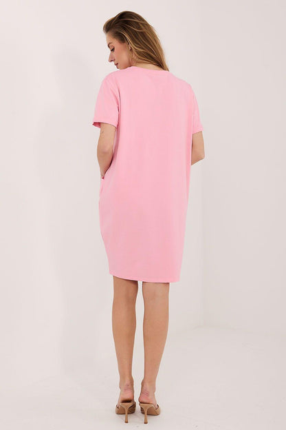 Pink short-sleeve daydress, back view above-knee length