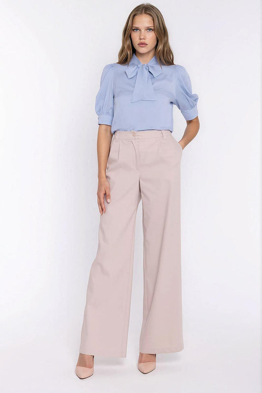 High-waist beige wide-leg jeans with front pockets