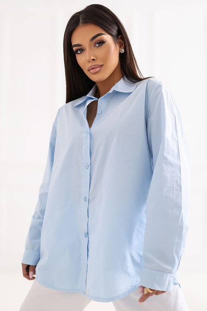 Light blue long-sleeve button-up shirt with pointed collar and front placket