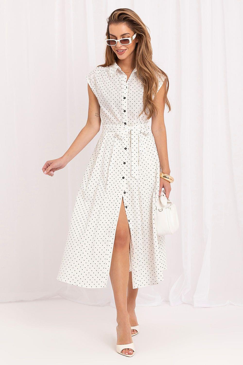 White sleeveless day dress with collar, button front, and small dotted pattern