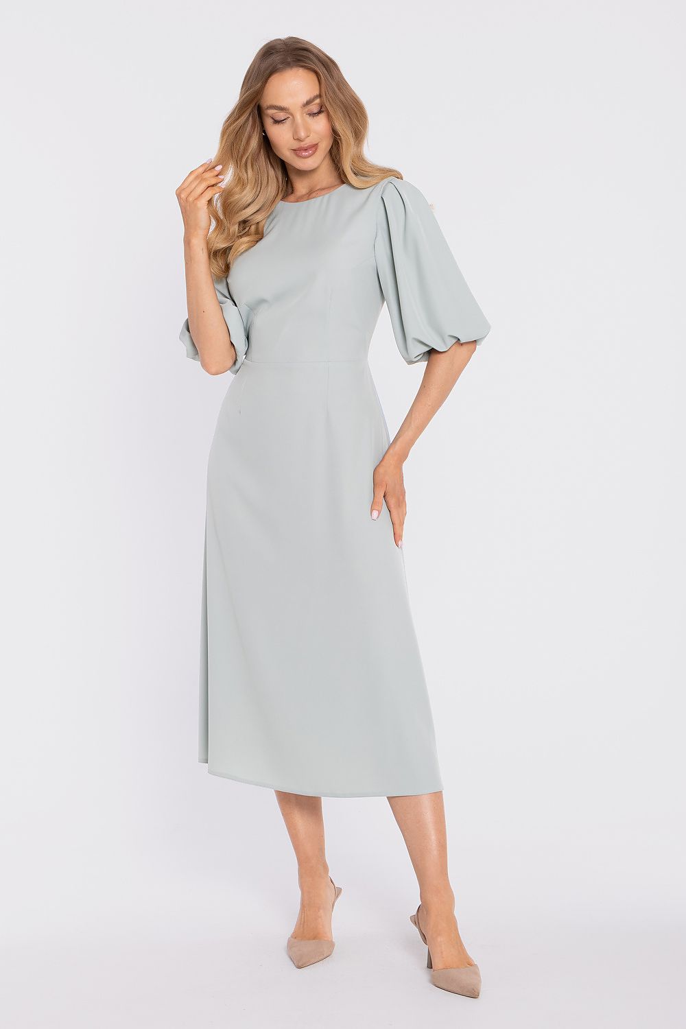 Cocktail dress in pastel blue with short puff sleeves and midi length, fitted waist