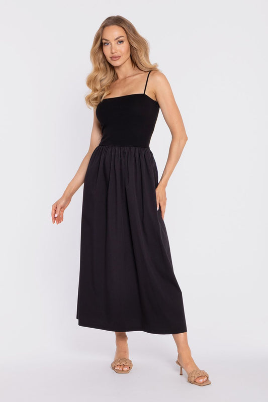Black daydress with spaghetti straps, fitted bodice and gathered midi skirt