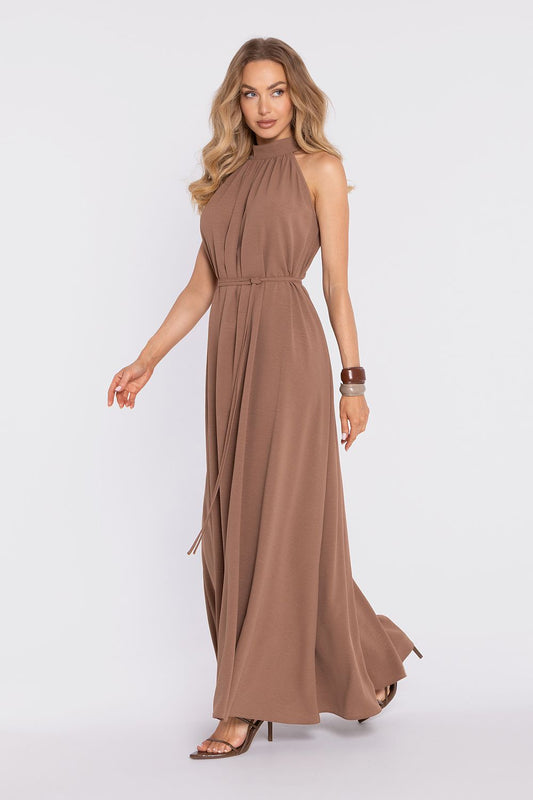 Brown halter sleeveless maxi daydress with tie waist and flowing skirt, side view