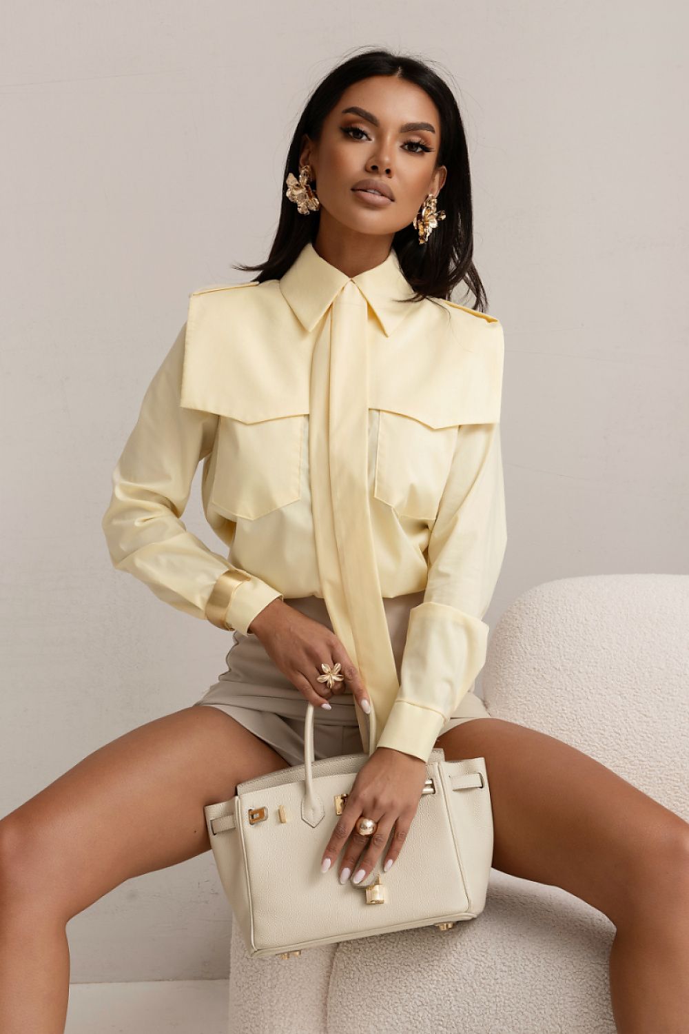 Yellow long-sleeve button-front shirt with flap pockets and pointed collar