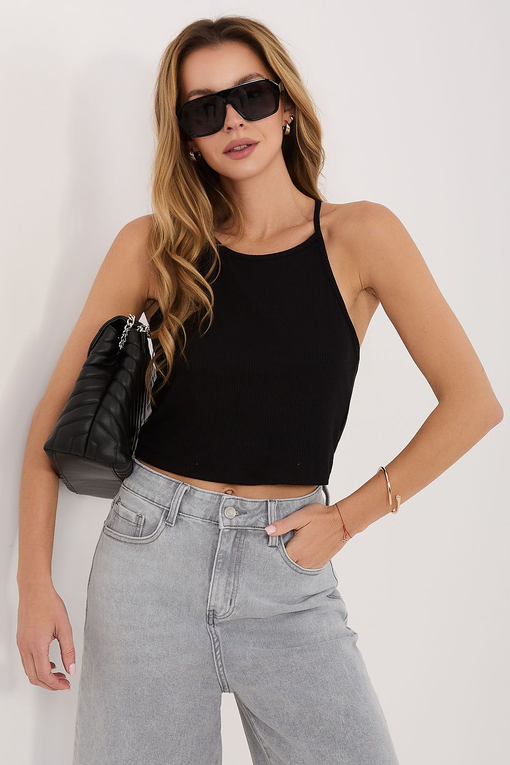 Black sleeveless crop top with slim straps