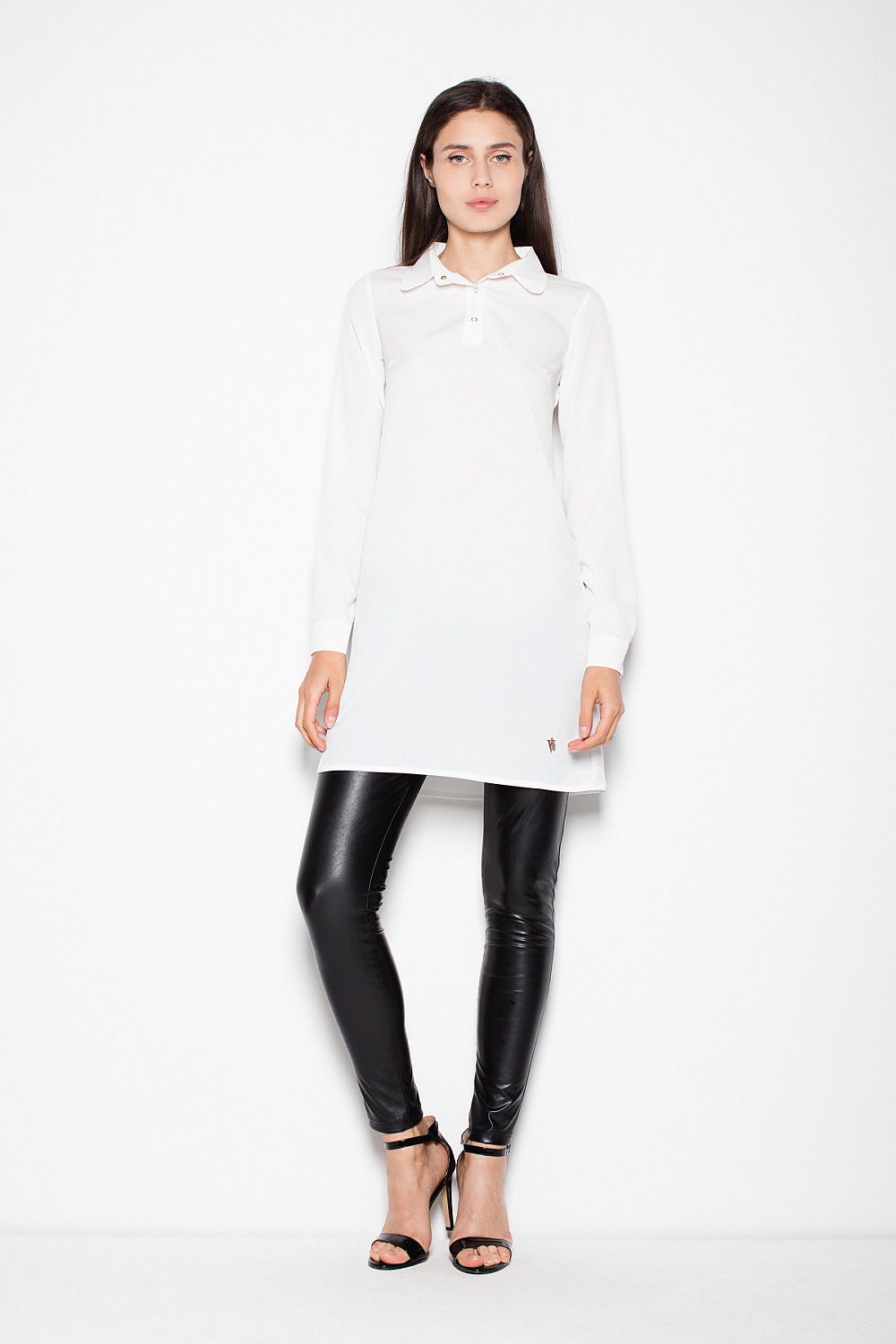 White long-sleeve knit blouse with button-up collar and tunic-length cut