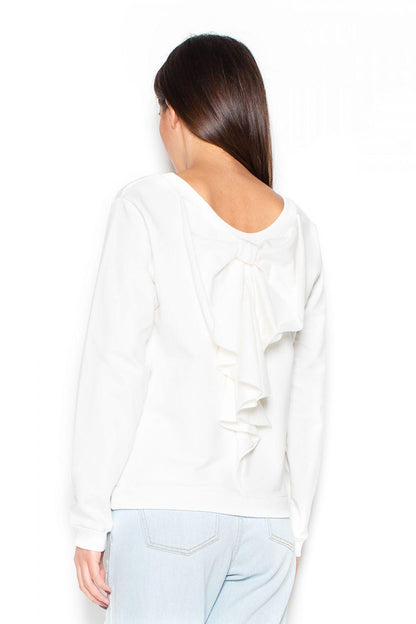 White long-sleeve blouse with hood and layered back ruffle
