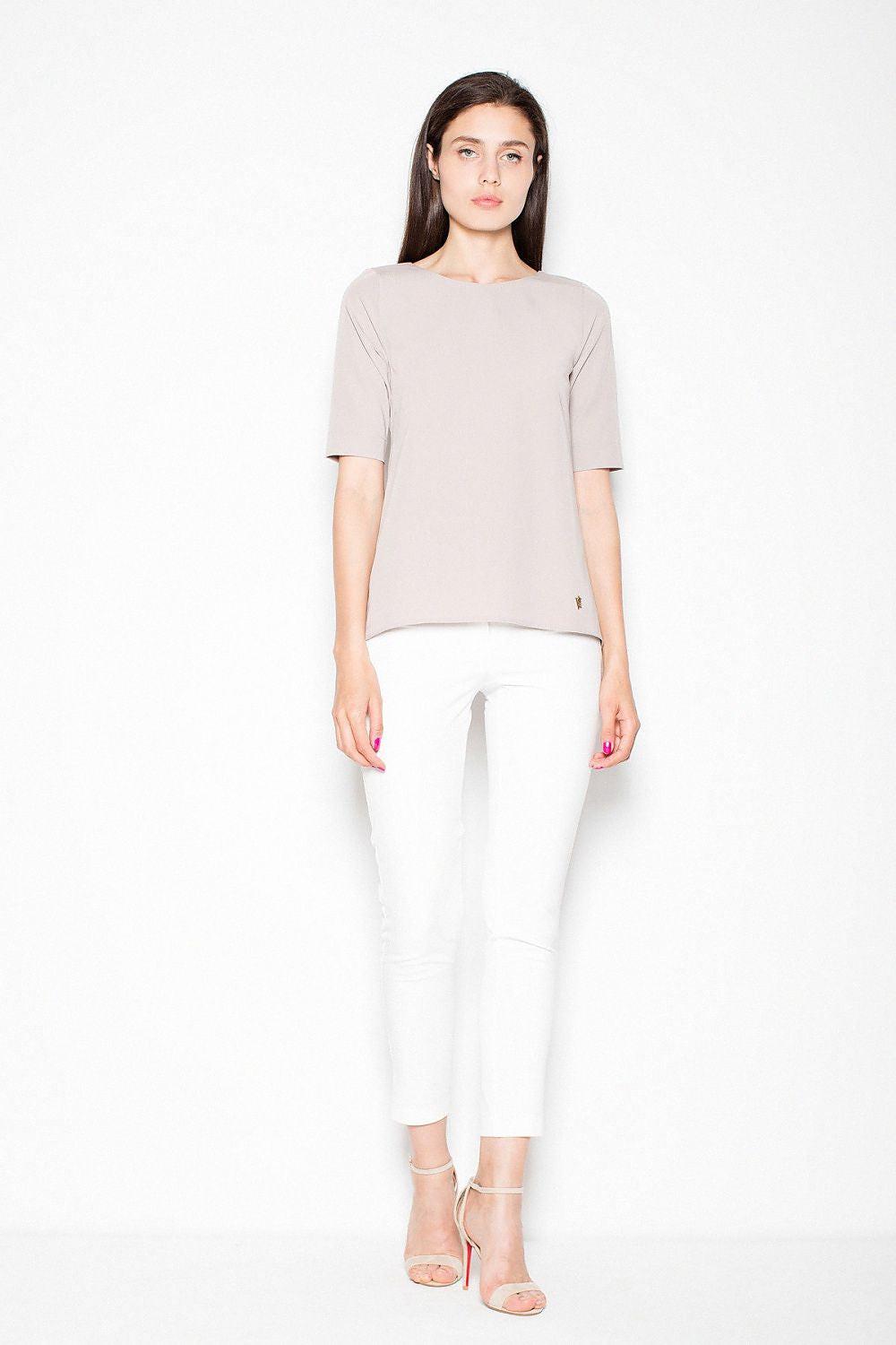 Beige short-sleeve blouse with round neckline and relaxed fit