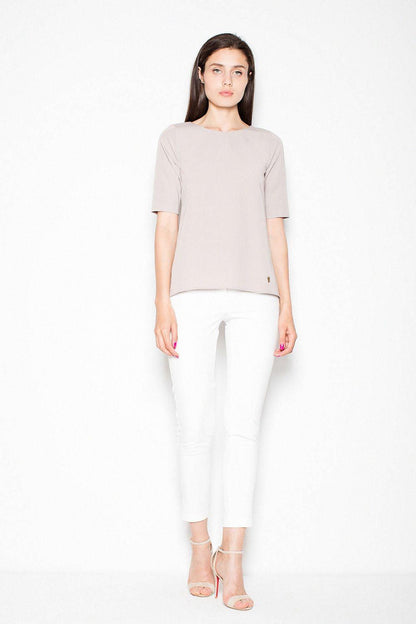 Beige short-sleeve blouse with round neckline and relaxed fit