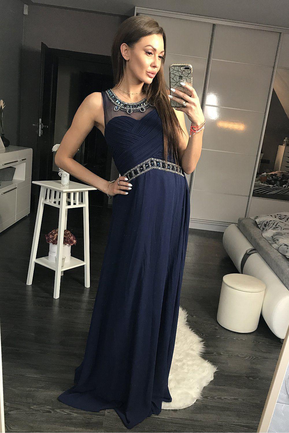Navy sleeveless maxi dress with jeweled neckline and embellished waist band