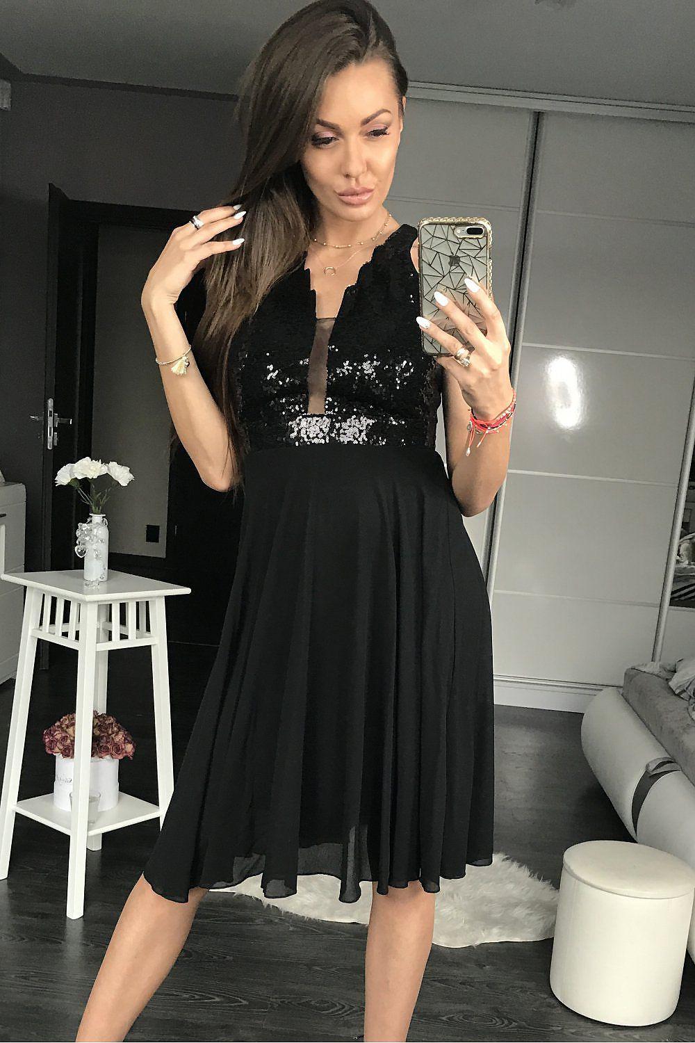 Black evening dress with sequin lace bodice, sleeveless V-neck, flared knee-length skirt