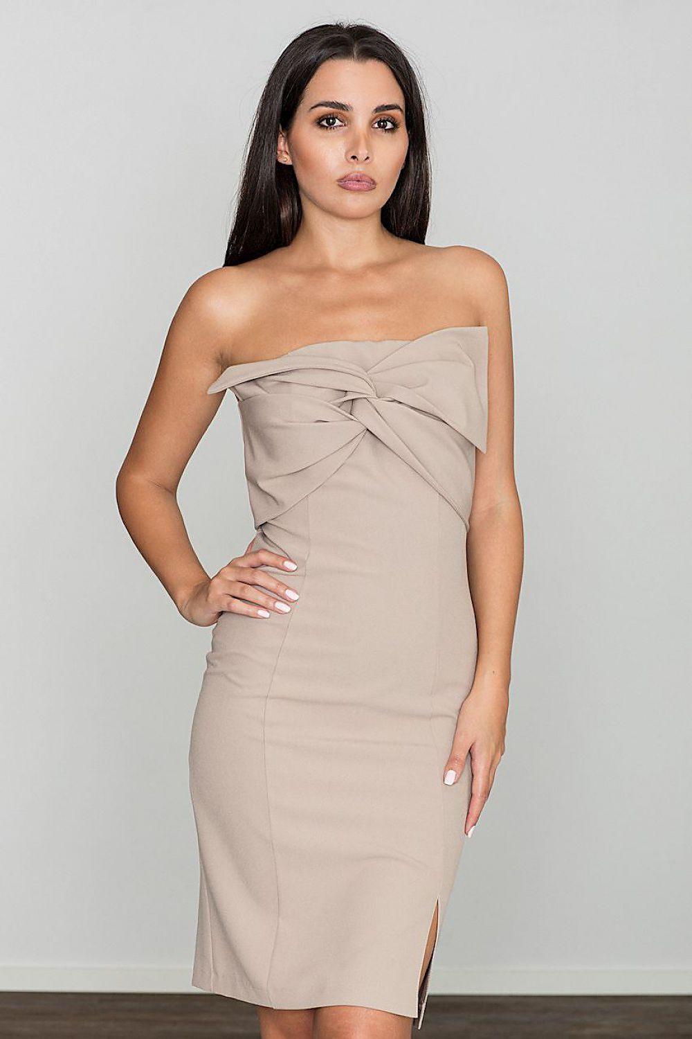Beige strapless cocktail dress with draped bow detail at the bust and fitted pencil silhouette