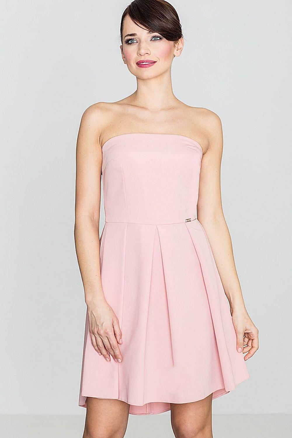 Pink strapless cocktail dress with fitted bodice and pleated flared skirt