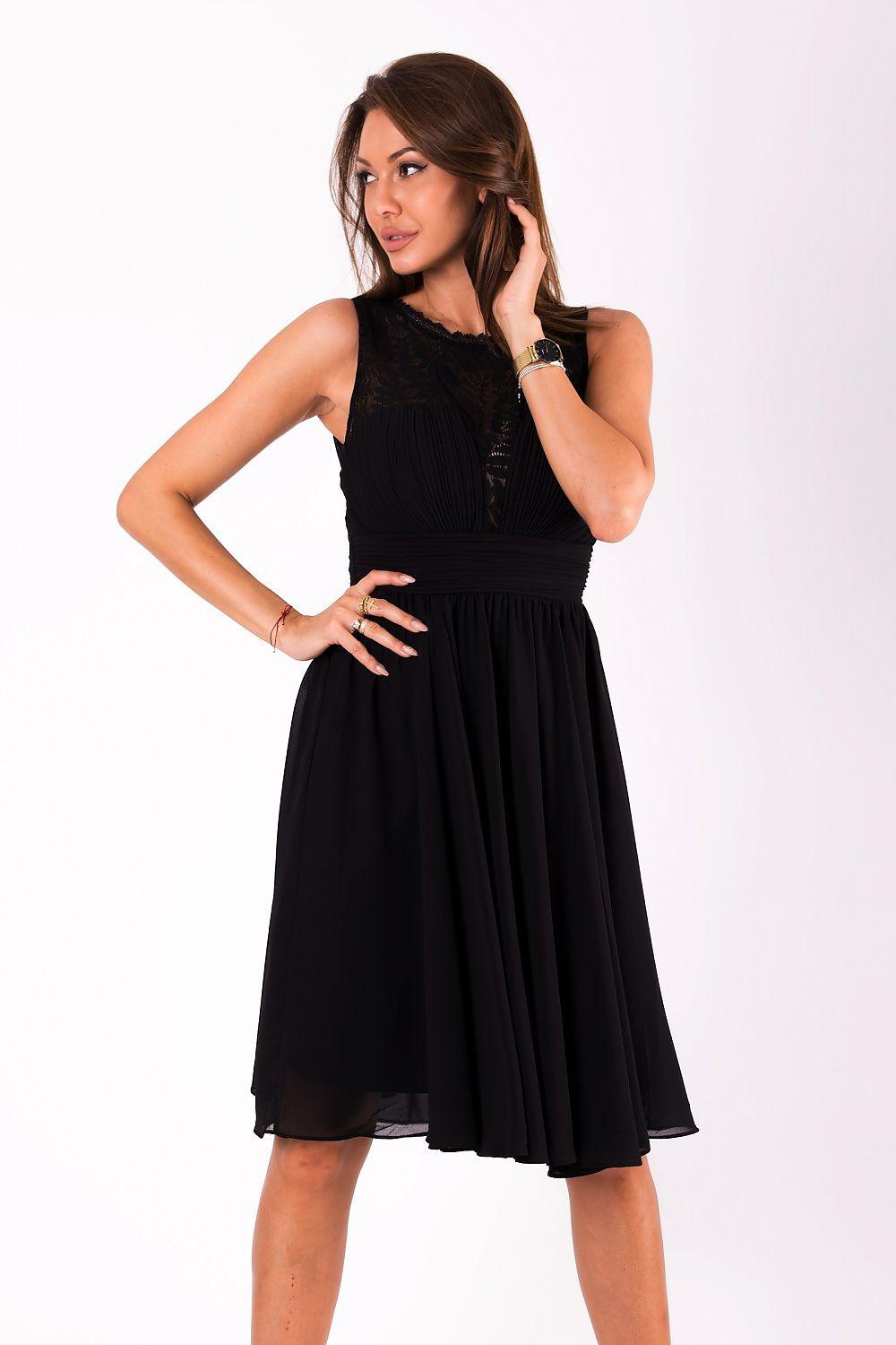 Black sleeveless mini dress with lace-textured bodice and gathered skirt, front view